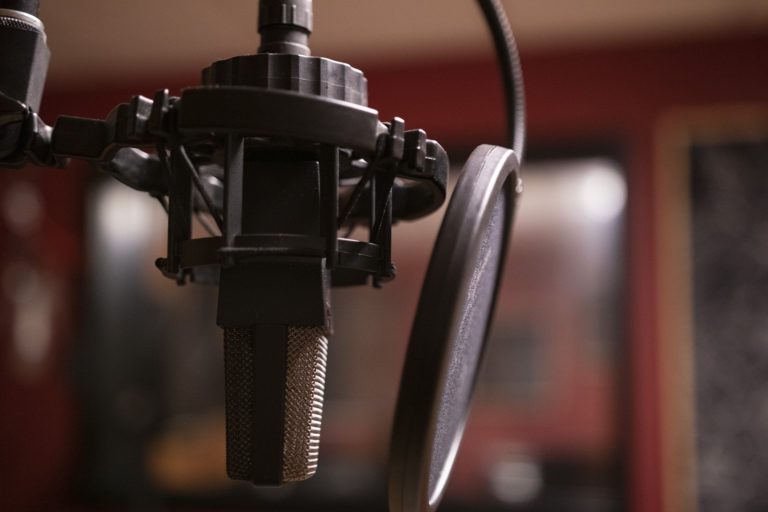 A photo of professional recording equipment being used to produce a podcast.