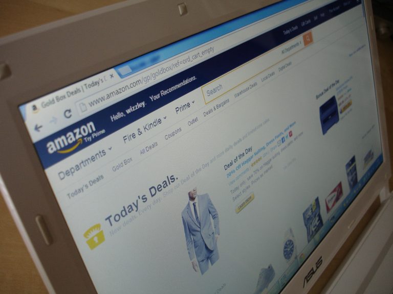 Amazon's website, as shown on a laptop computer.